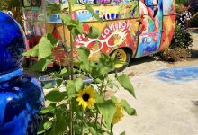Colorful painted trailer and garden at Leoma Lovegrove Gallery in Matlacha Florida.