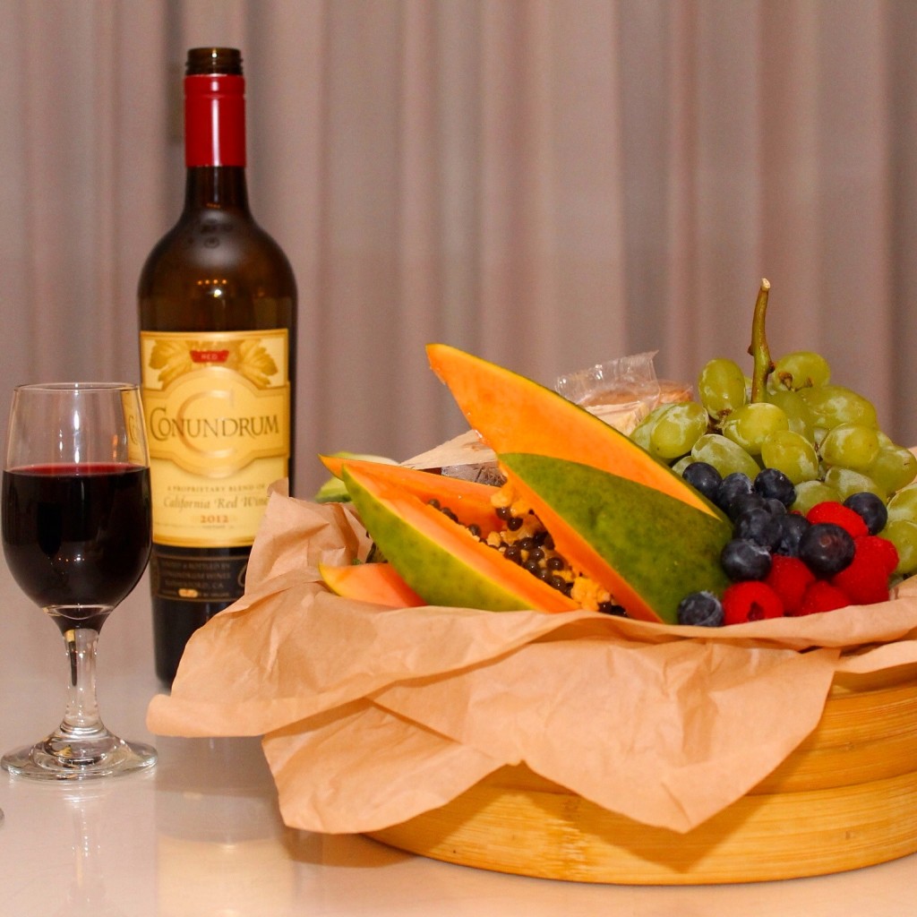 fruit basket and red wine