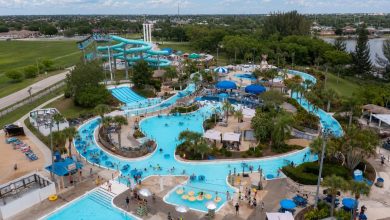 Aerial view of Sun Splash Family Waterpark in Cape Coral with slides, pools, lazy river, and Paradise Cove wave pool